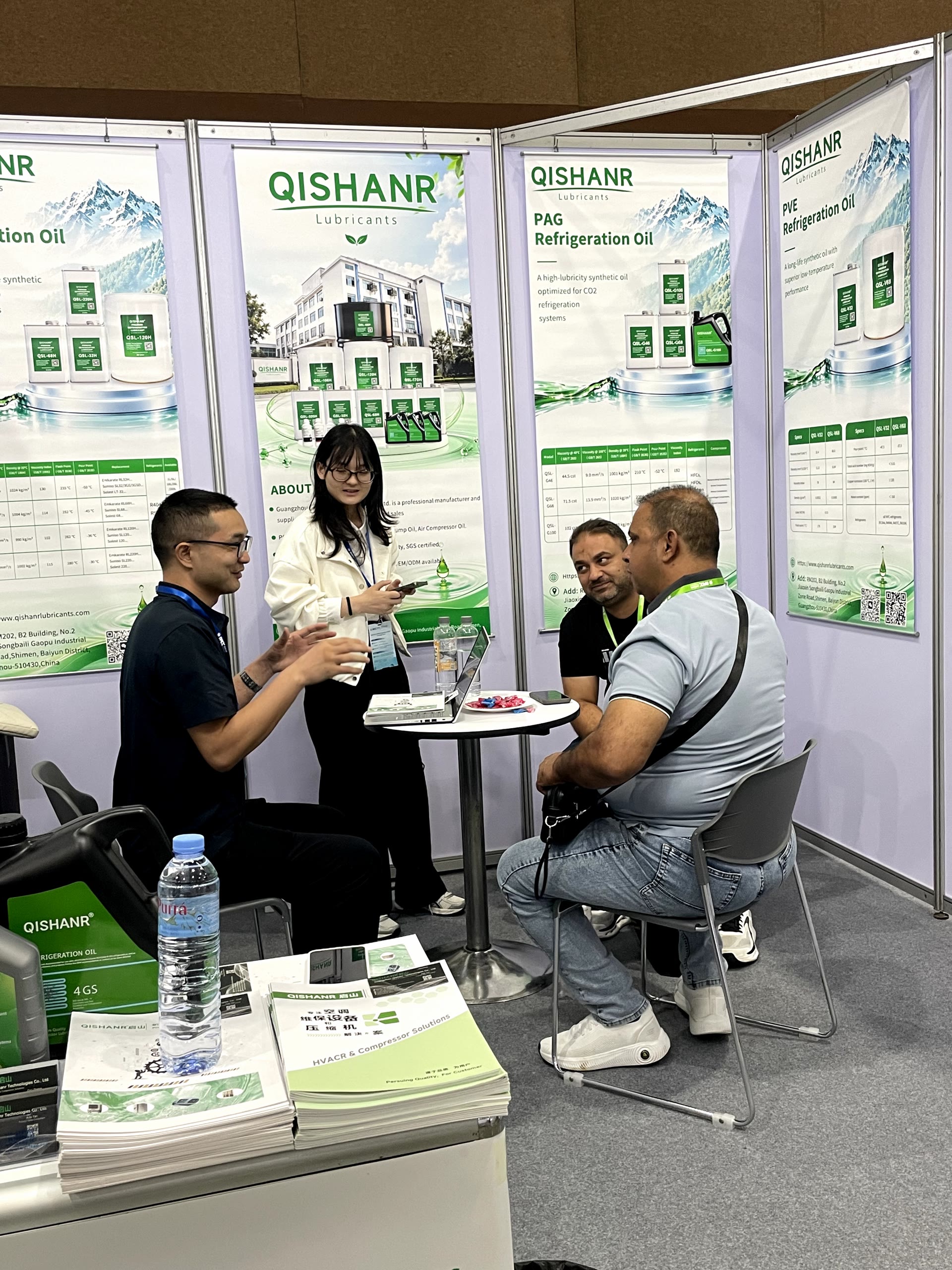 Technical discussion at QISHANR Booth A09 in Bangkok
