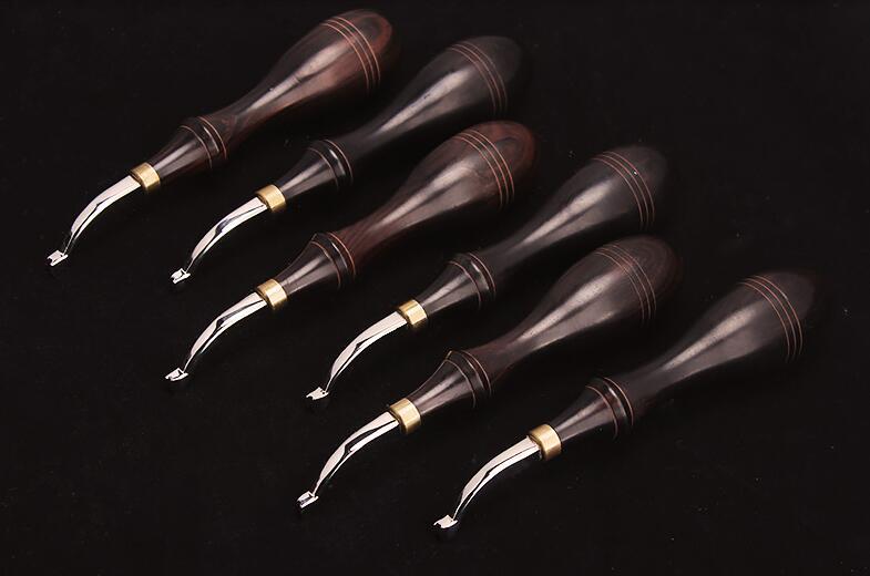 KL ebony handle creaser