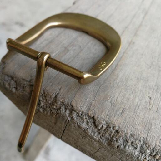 Custom made solid brass belt buckle