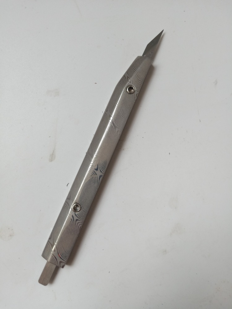 Stainless steel damascus handle clicking knife