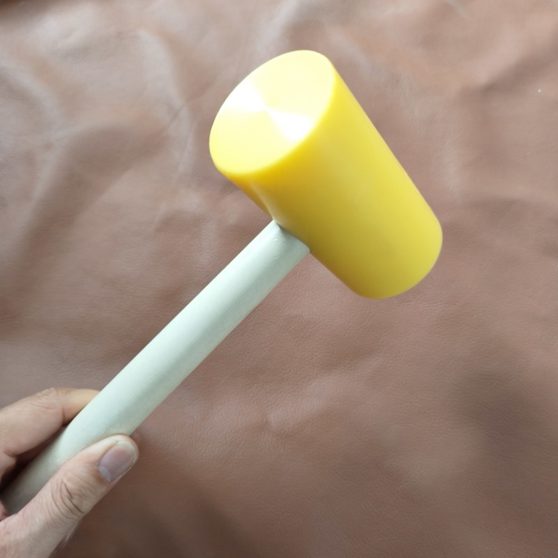 Nylon hammer for stiching iron and punch