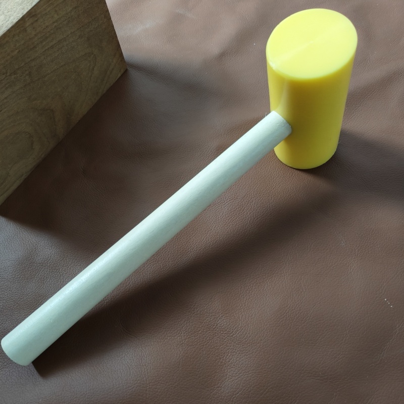 Nylon hammer for stiching iron and punch