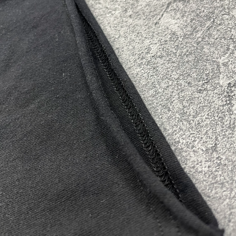 Distressed dark punk trend brand printed T-shirt with scattered edges
