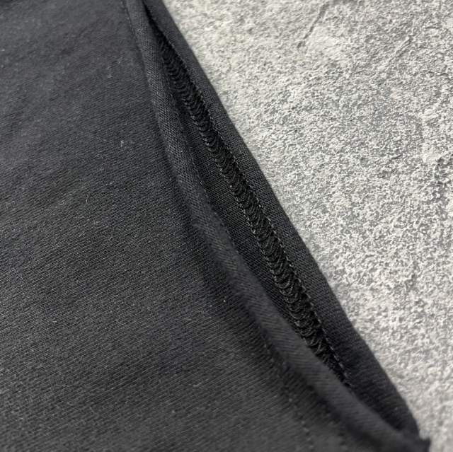 Distressed dark punk trend brand printed T-shirt with scattered edges