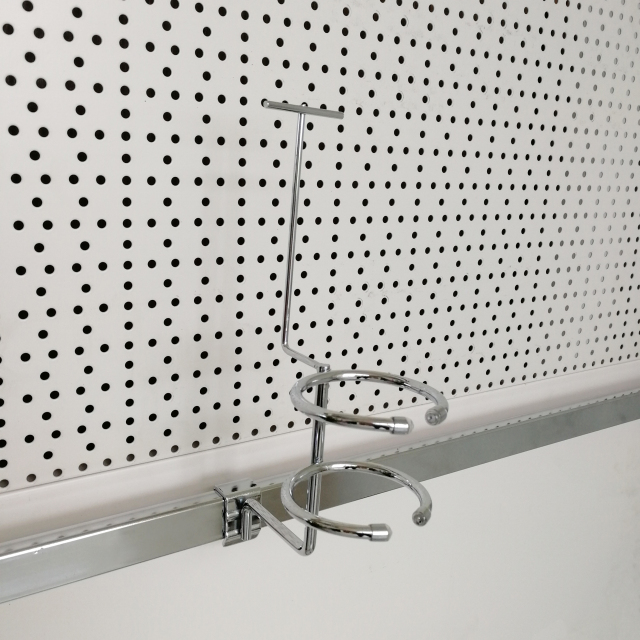 Hair dryer holder with top price tag holder