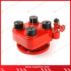 4-way breeching inlet with brass or gunmetal body and protective caps, used for high-rise or large facility fire protection systems
