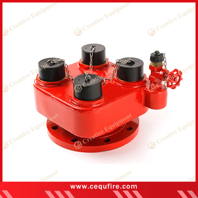 4-way breeching inlet with brass or gunmetal body and protective caps, used for high-rise or large facility fire protection systems