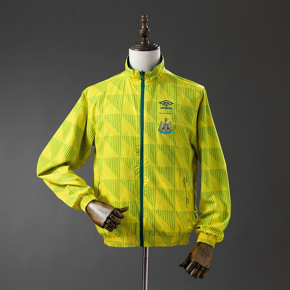 NEWCASTLE UNITED REVERSIBLE JACKET WINDBREAKER - ARMY GREEN & YELLOW