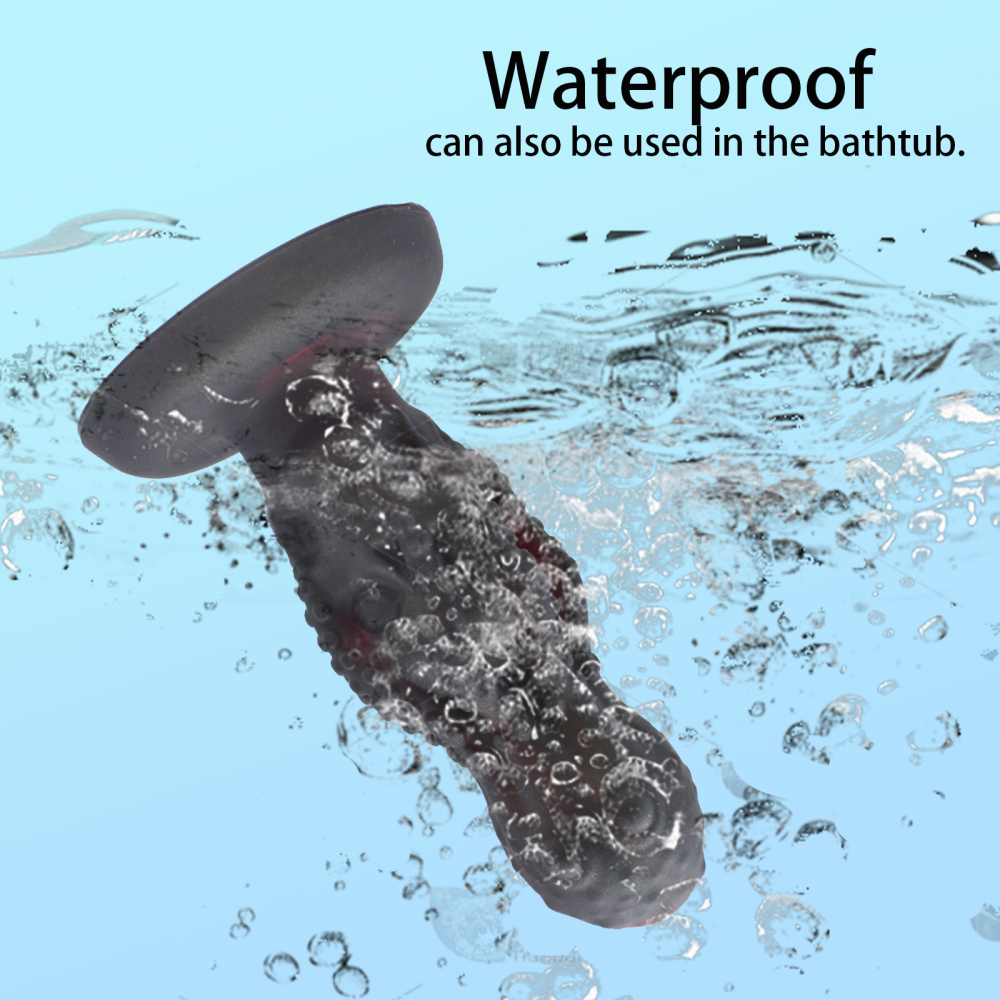 The false penis in the shape of an octopus skull anus plug is made of silicone and has suction cups