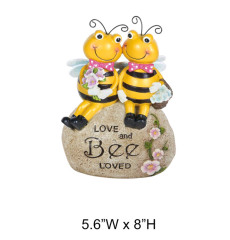 Bees Sitting On Carved Stone Statue
