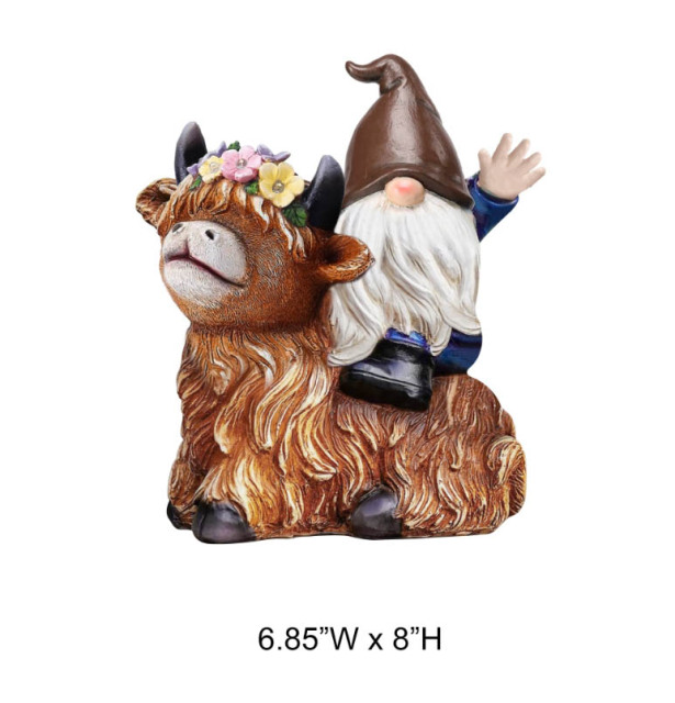 Gnome Sitting On Cattle Statue