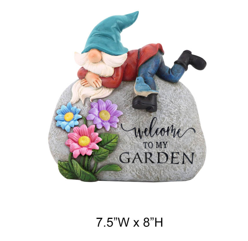 Gnome Lying On Stone Statue