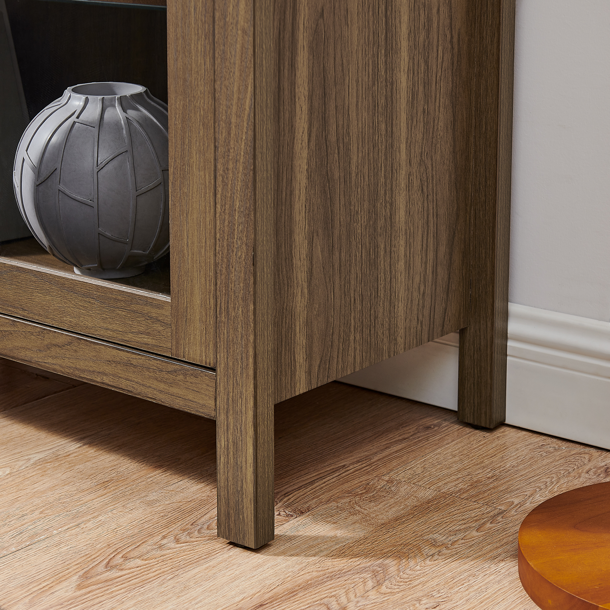 A high arched storage cabinet with a lamp, a modern retro-style wooden storage cabinet with adjustable glass partitions, suitable for use as a multi-functional cabinet in kitchens