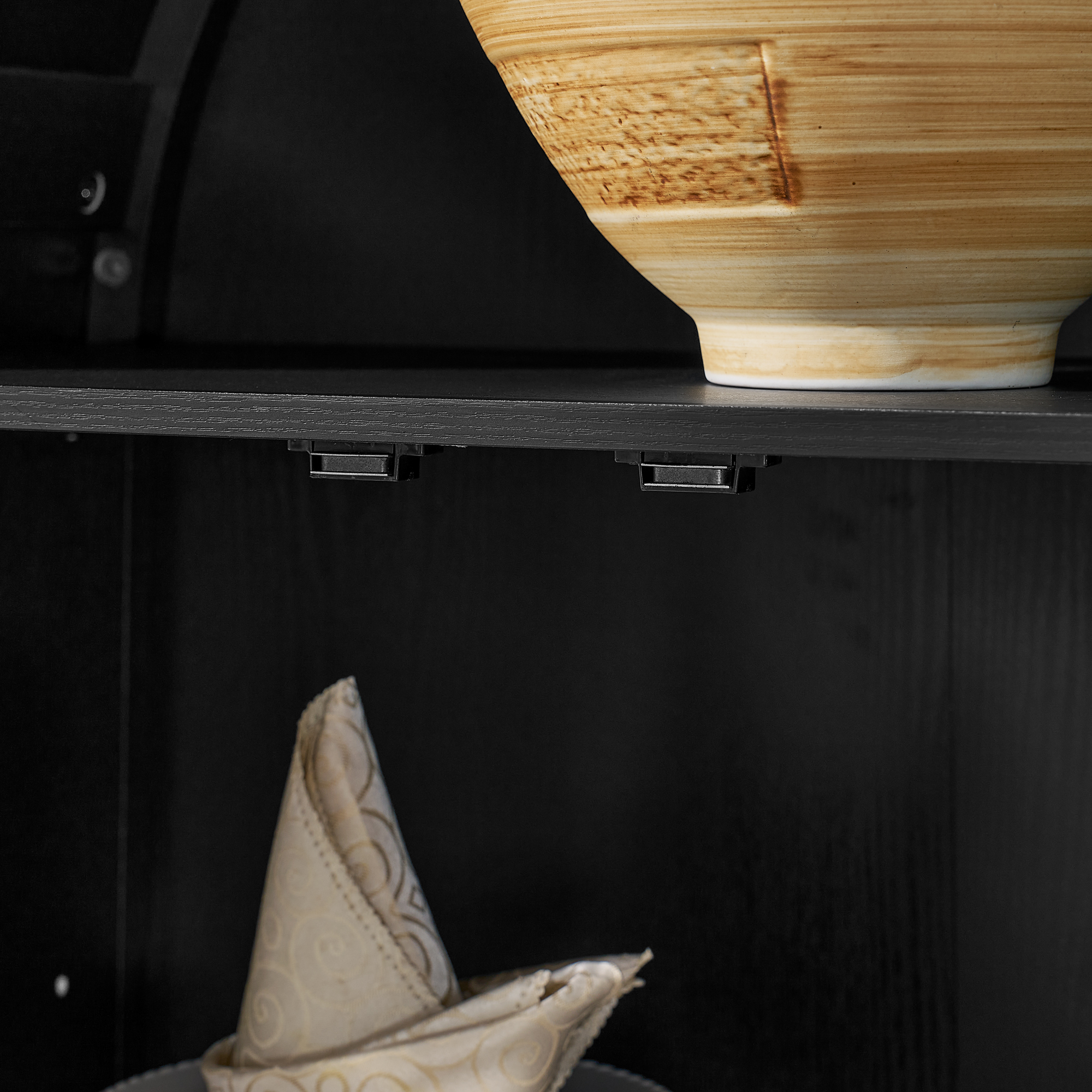A high arched storage cabinet with a lamp, a modern retro-style wooden storage cabinet with adjustable glass partitions, suitable for use as a multi-functional cabinet in kitchens