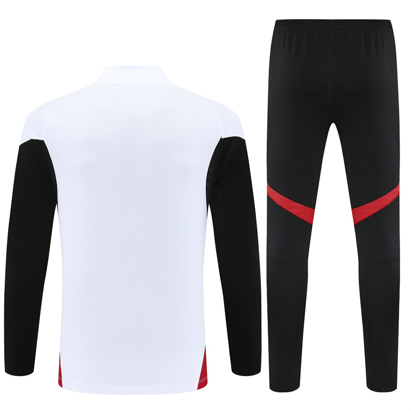 Manchester United 1/4 Zip Tracksuit 2025/26 Kids Adult