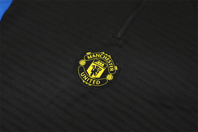 Manchester United 1/4 Zip Tracksuit 2025/26 Kids Adult