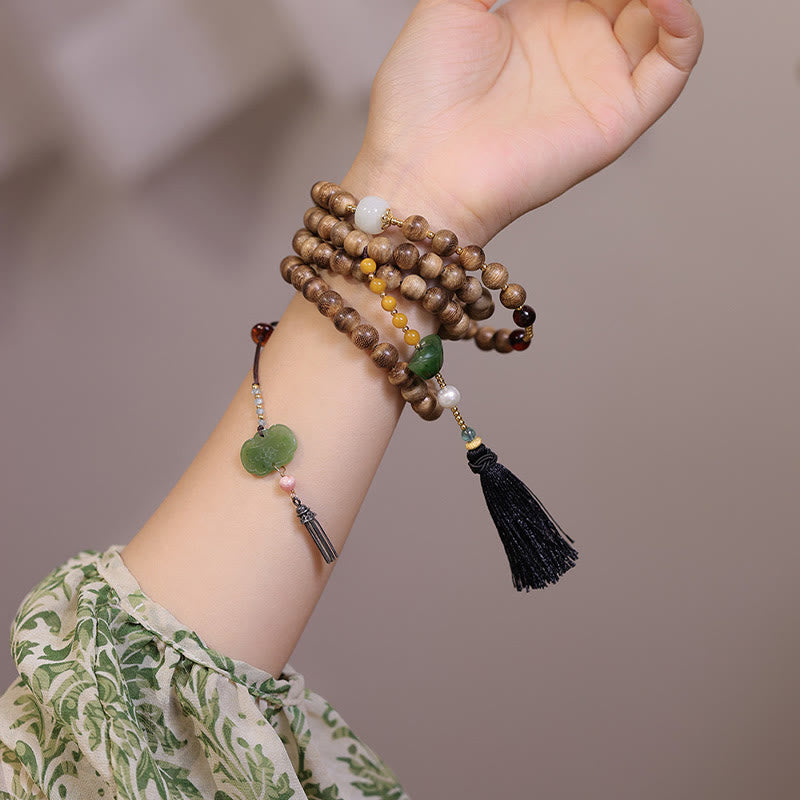 Natural Agarwood Amber Jade Ingot Tassel Ruyi Charm Bracelet
