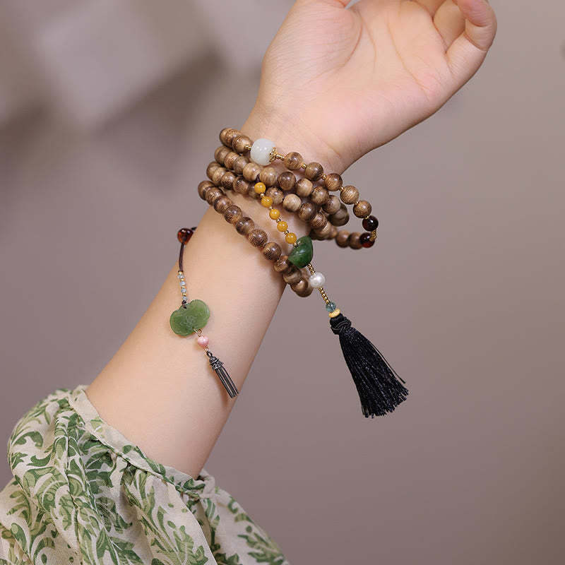 Natural Agarwood Amber Jade Ingot Tassel Ruyi Charm Bracelet