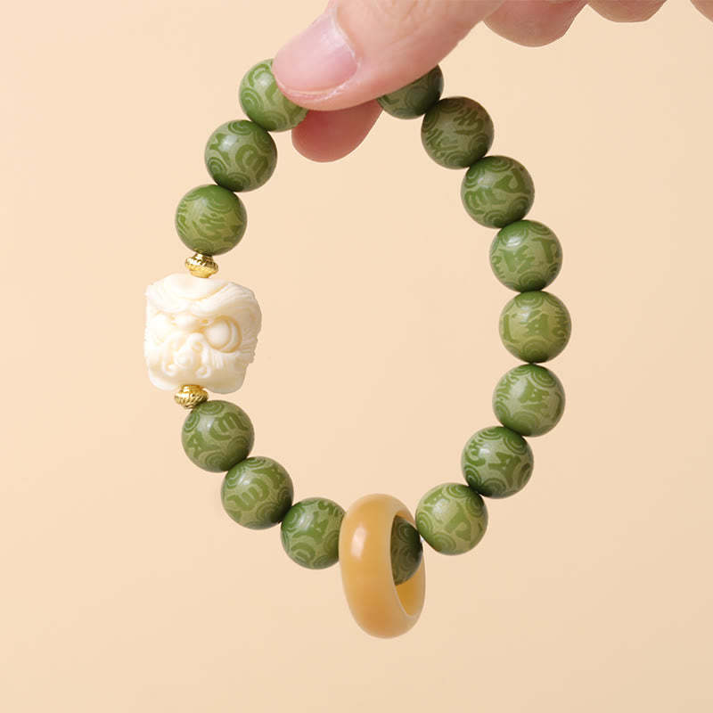 Green Bodhi Seed Ivory Fruit Dancing Lion Om Mani Padme Hum Engraved Peace Bracelet