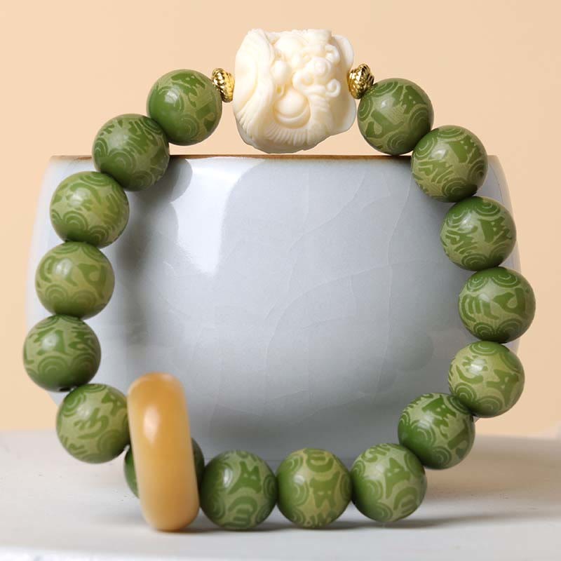 Green Bodhi Seed Ivory Fruit Dancing Lion Om Mani Padme Hum Engraved Peace Bracelet