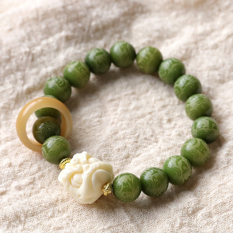 Green Bodhi Seed Ivory Fruit Dancing Lion Om Mani Padme Hum Engraved Peace Bracelet