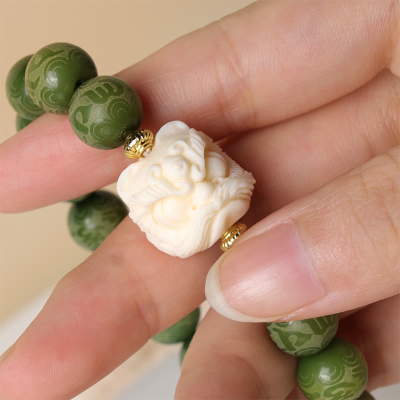 Green Bodhi Seed Ivory Fruit Dancing Lion Om Mani Padme Hum Engraved Peace Bracelet