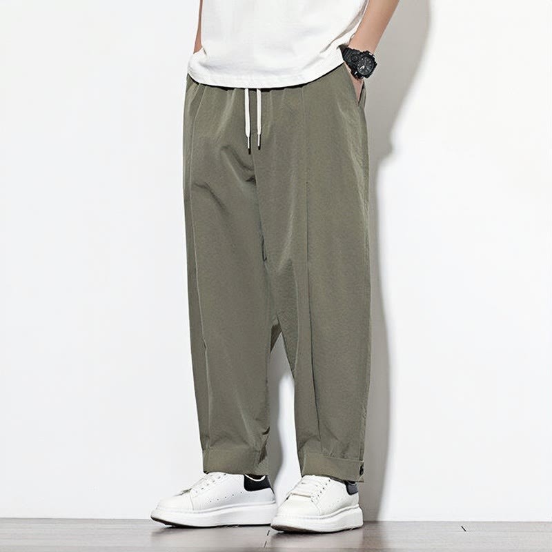 Casual Solid Color Drawstring Men's Harem Pants With Pockets