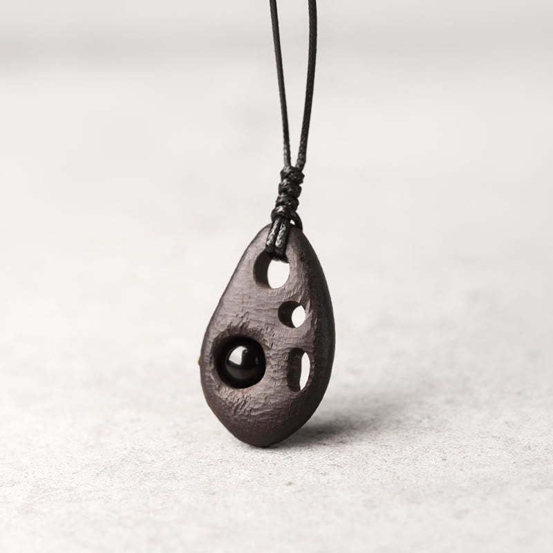 Ebony Wood Hollow Inlaid Obsidian Peace Calm Necklace Pendant