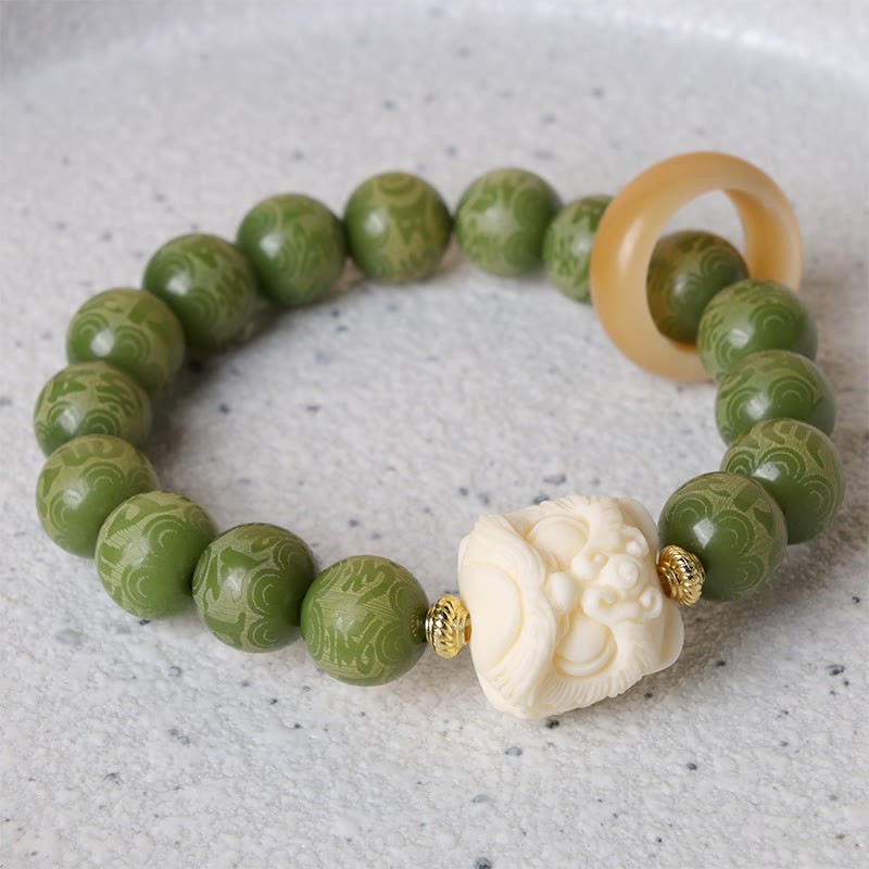 Green Bodhi Seed Ivory Fruit Dancing Lion Om Mani Padme Hum Engraved Peace Bracelet