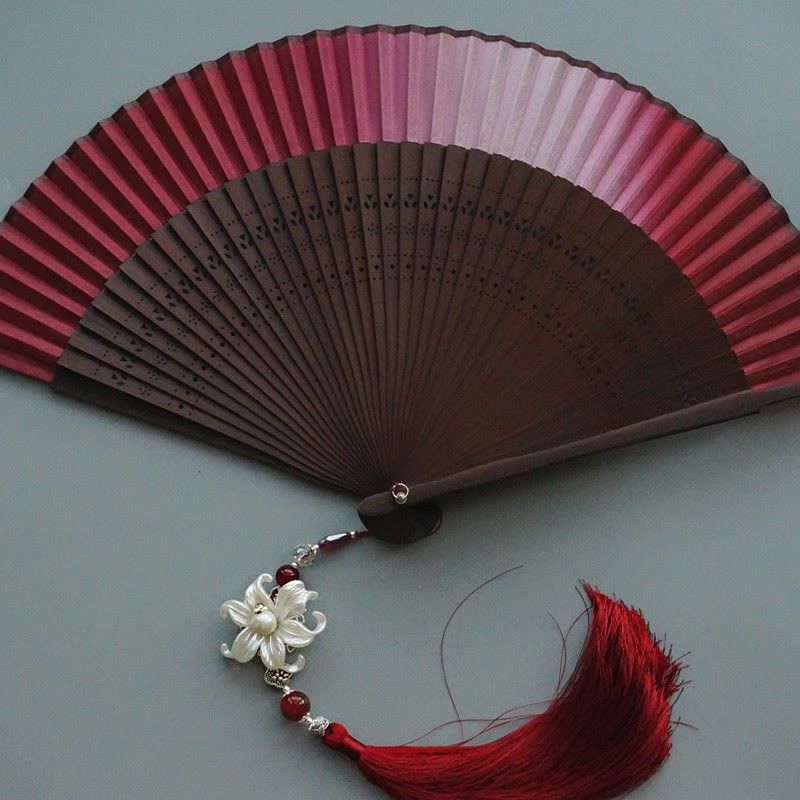 Red Lily Tassel Hollow Rib Silk Handheld Bamboo Folding Fan