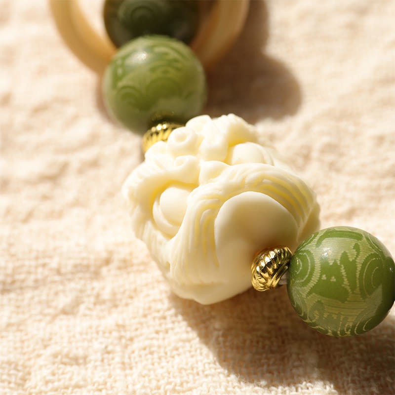 Green Bodhi Seed Ivory Fruit Dancing Lion Om Mani Padme Hum Engraved Peace Bracelet