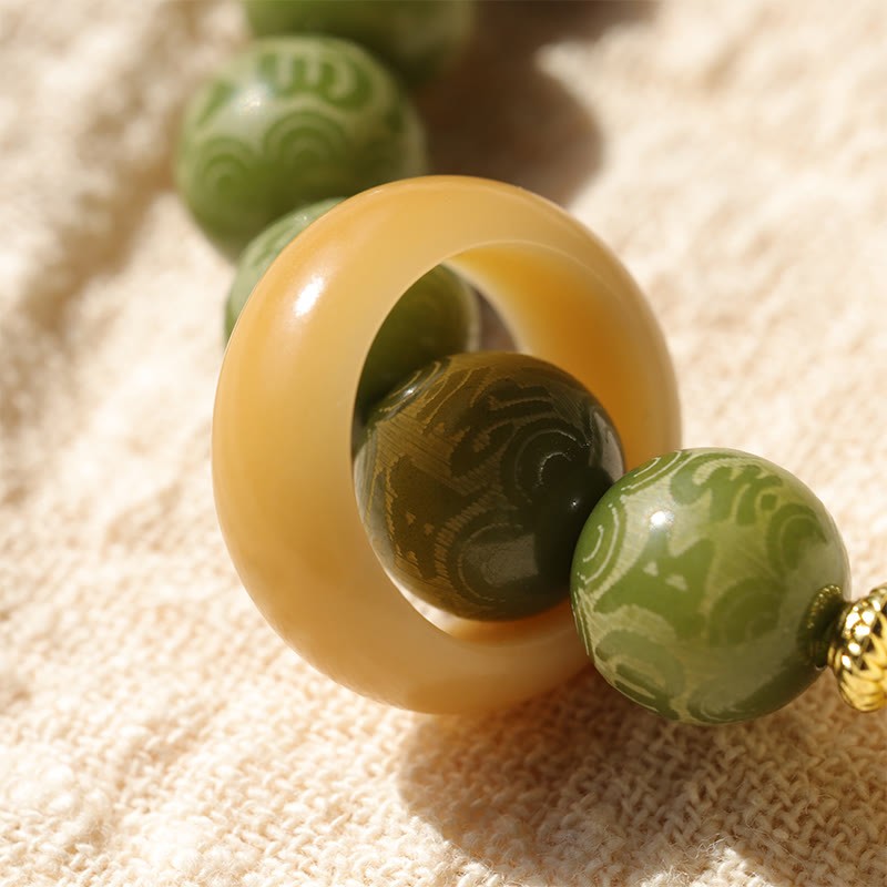 Green Bodhi Seed Ivory Fruit Dancing Lion Om Mani Padme Hum Engraved Peace Bracelet