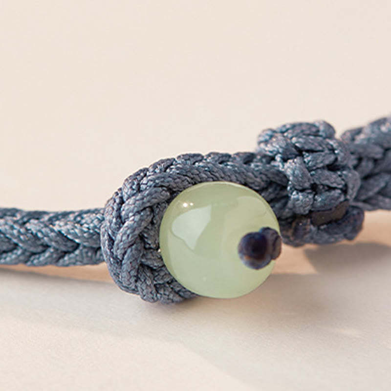 Hetian Jade Lotus Peace Buckle Braided Rope Fortune Bracelet