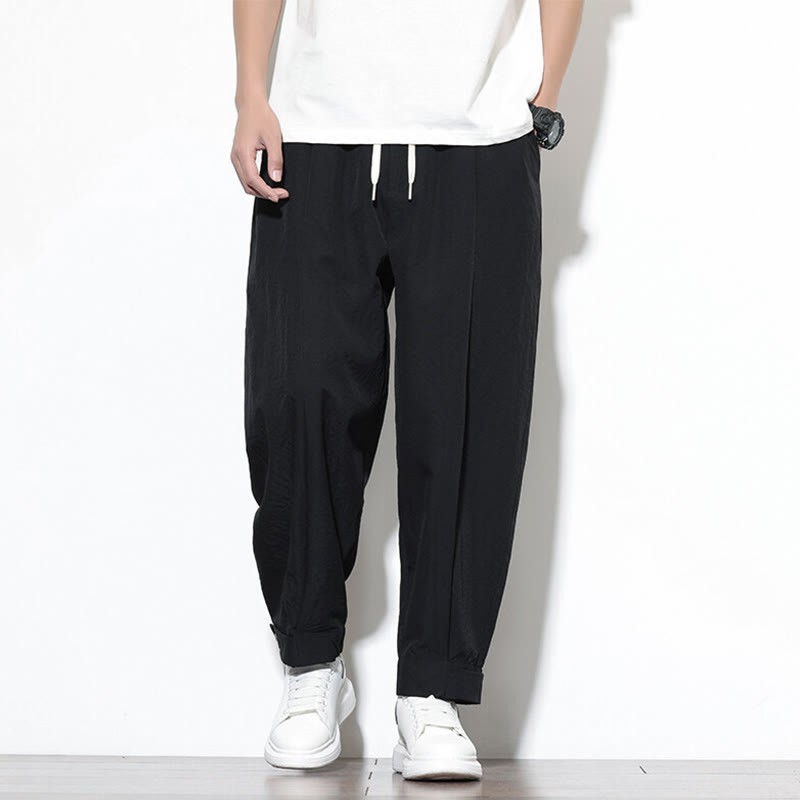 Casual Solid Color Drawstring Men's Harem Pants With Pockets