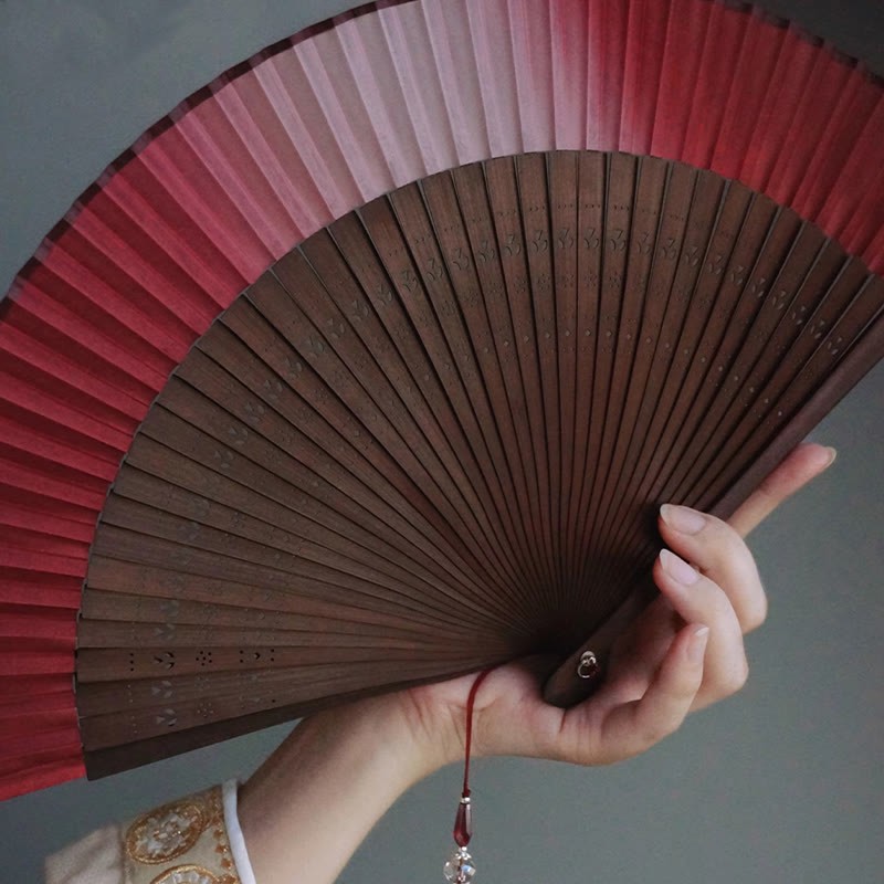 Red Lily Tassel Hollow Rib Silk Handheld Bamboo Folding Fan