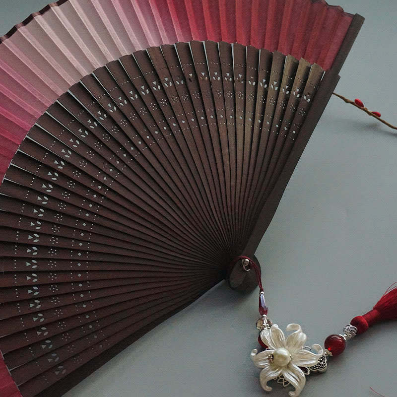 Red Lily Tassel Hollow Rib Silk Handheld Bamboo Folding Fan