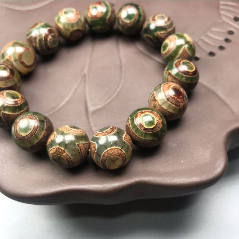 Three-eyed Dzi Bead Sardonyx Luck Bracelet