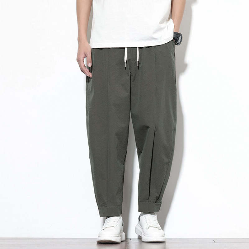 Casual Solid Color Drawstring Men's Harem Pants With Pockets