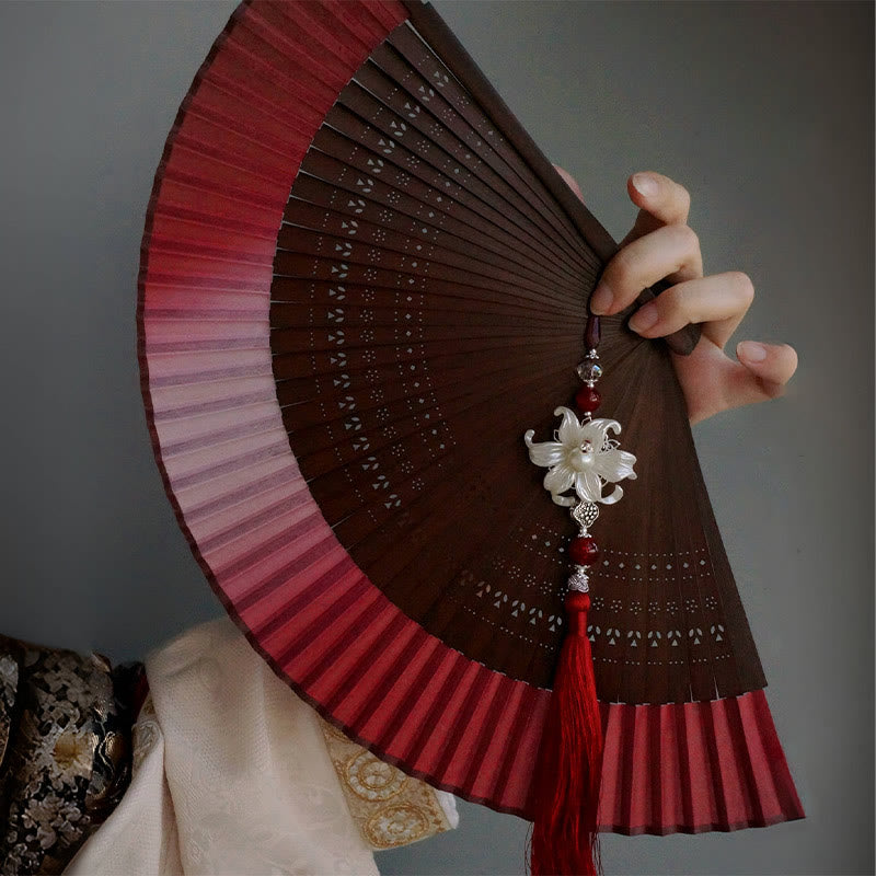 Red Lily Tassel Hollow Rib Silk Handheld Bamboo Folding Fan