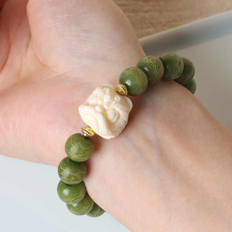 Green Bodhi Seed Ivory Fruit Dancing Lion Om Mani Padme Hum Engraved Peace Bracelet