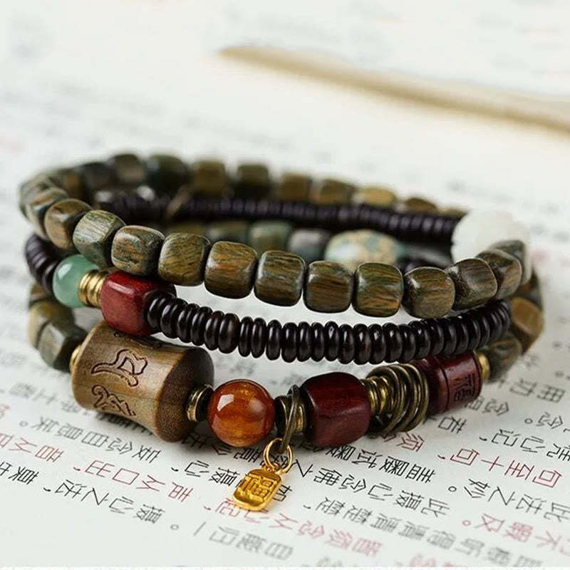 Green Sandalwood Ebony Om Mani Padme Hum Engraved Peace Triple Wrap Bracelet