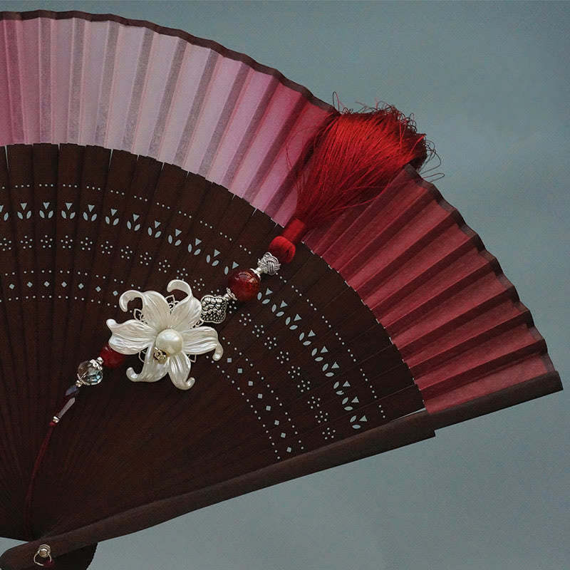 Red Lily Tassel Hollow Rib Silk Handheld Bamboo Folding Fan