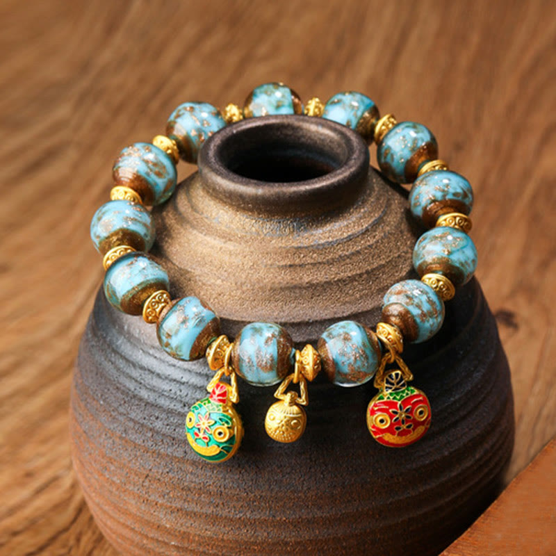 Gold Swallowing Beast Family Charm Liuli Glass Bead Fortune Bracelet