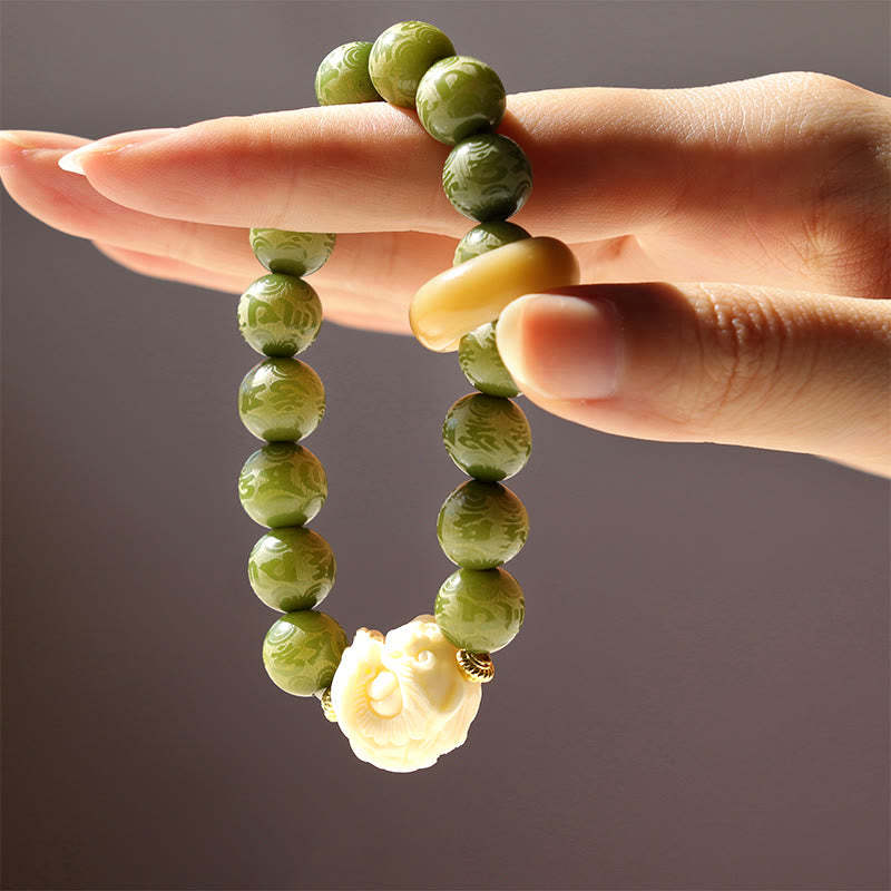 Green Bodhi Seed Ivory Fruit Dancing Lion Om Mani Padme Hum Engraved Peace Bracelet