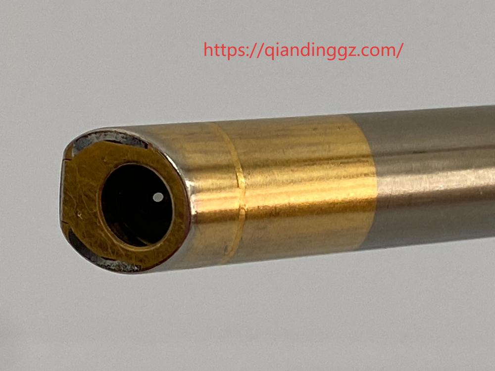 Gold-colored 30 degree distal tip objective lens of Olympus WA53005A