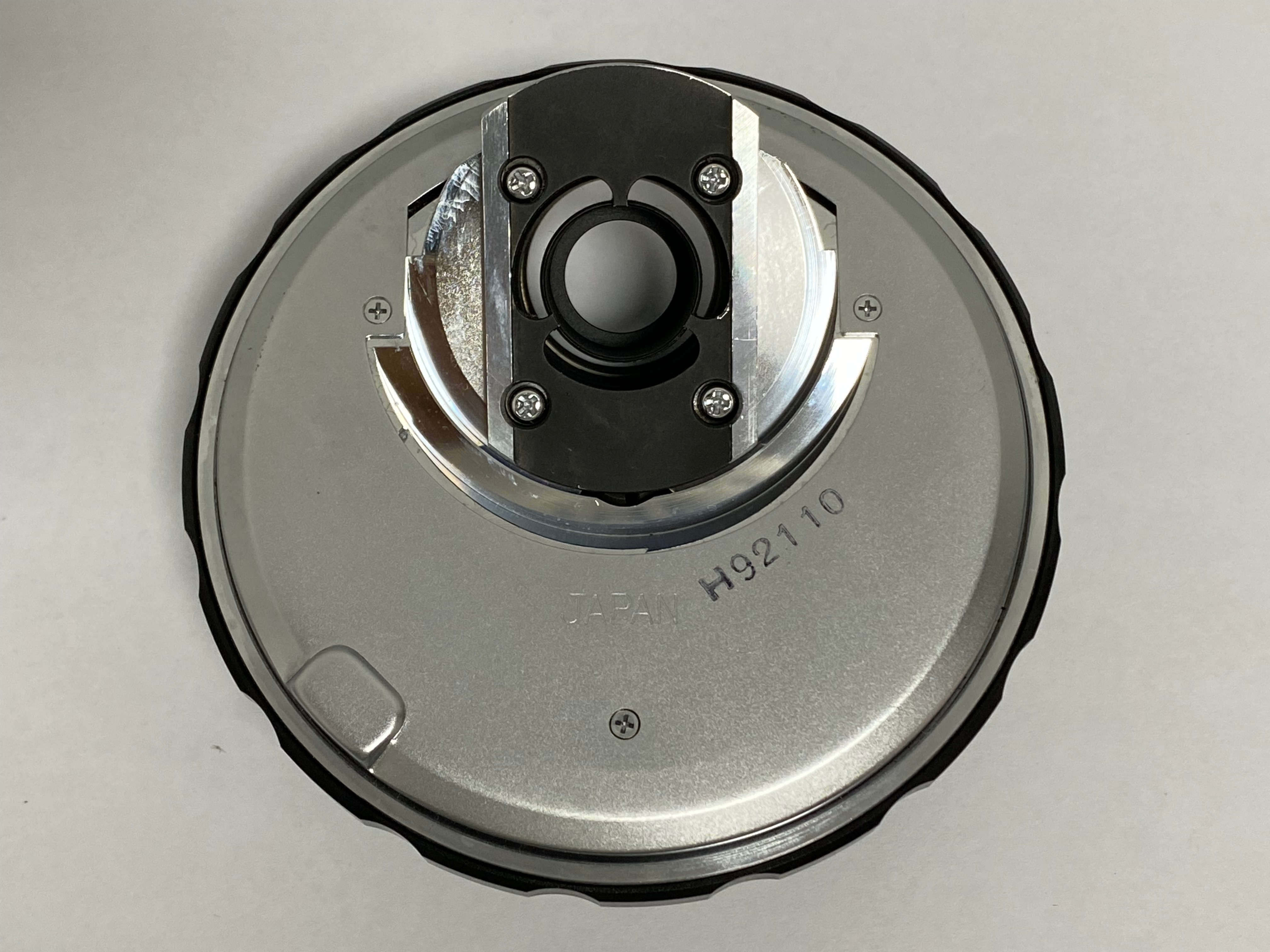 Olympus microscope nosepiece dovetail mount showing serial number H92110 Japan