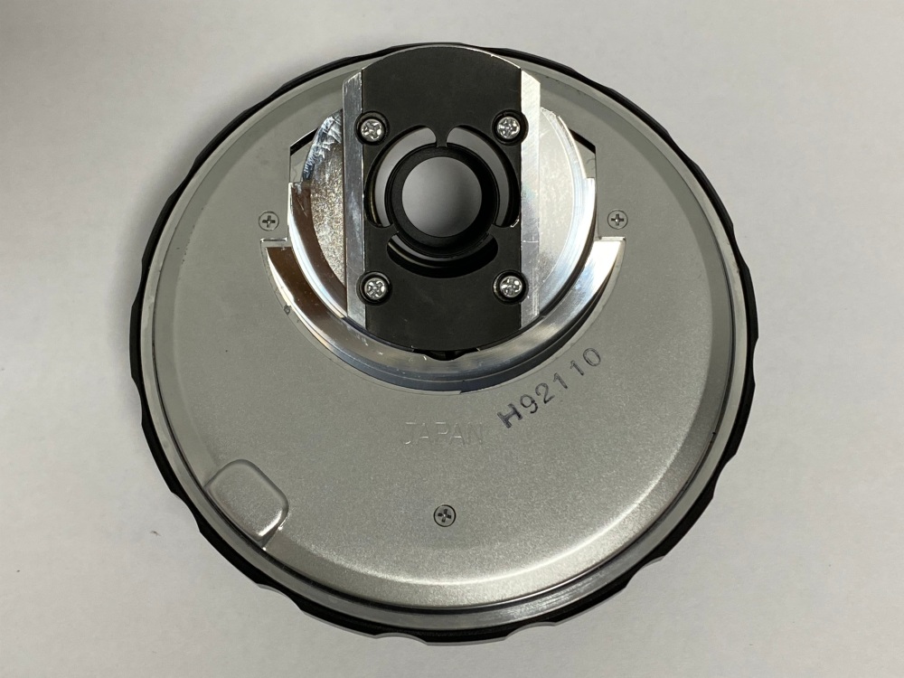 Olympus microscope nosepiece dovetail mount showing serial number H92110 Japan