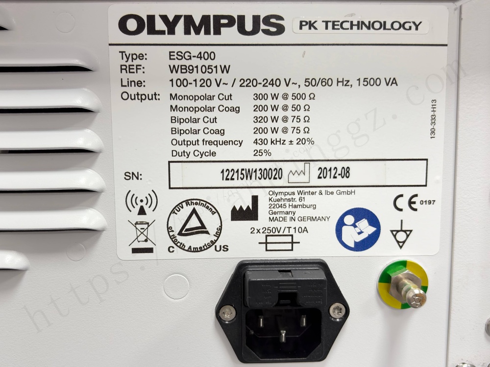 Specification label of Olympus ESG-400 showing SN 12215W130020 and technical data