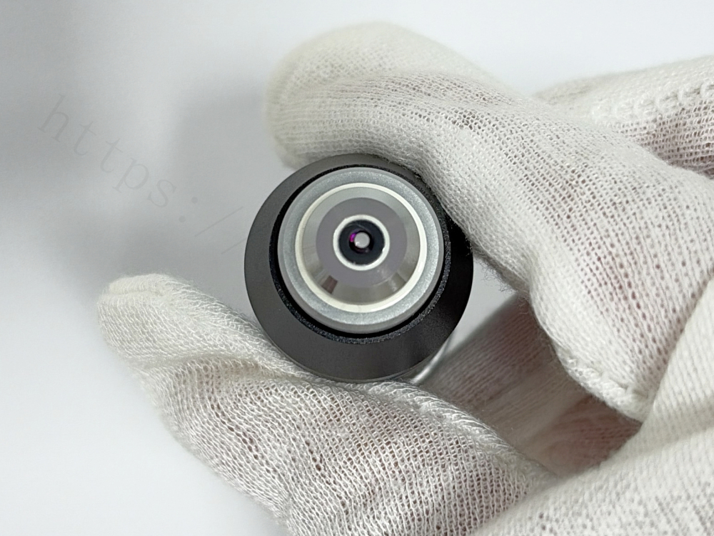 Front lens view of Nikon BE2 Plan 60X microscope objective lens