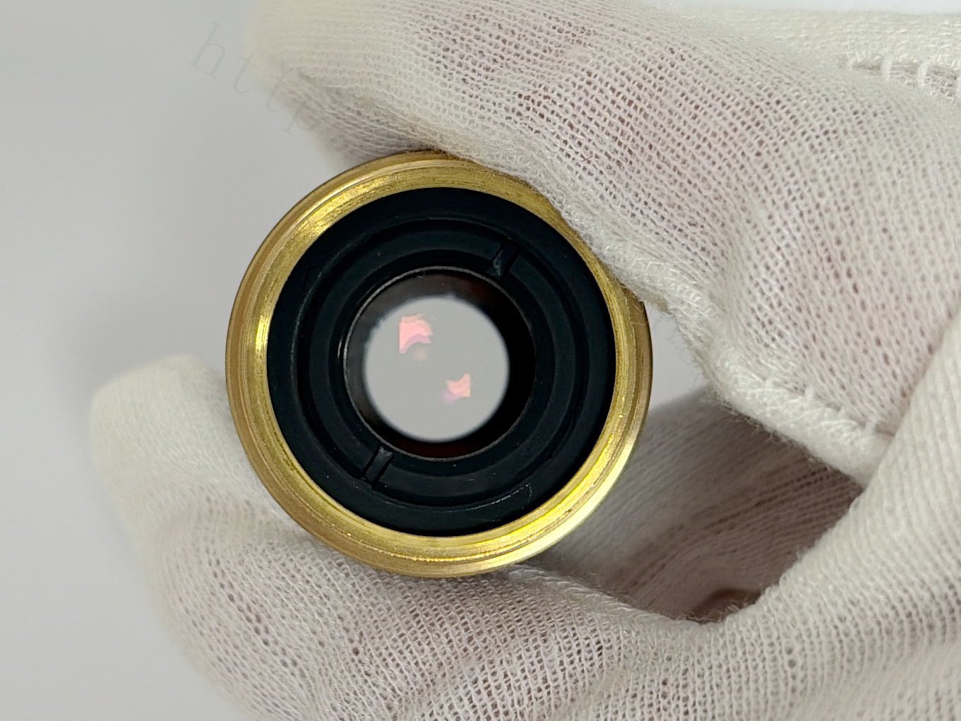 Mounting thread side of Nikon Plan 4X microscope objective